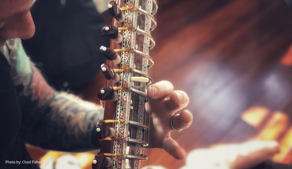 Playing the sitar